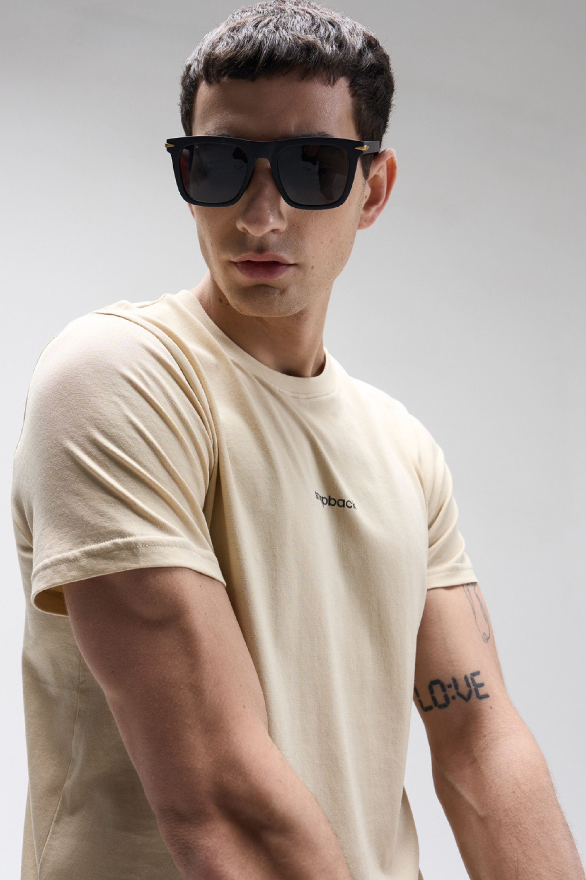 Men’s regular fit SoftLuxe Crew T-shirt in summer sand with subtle logo on chest.