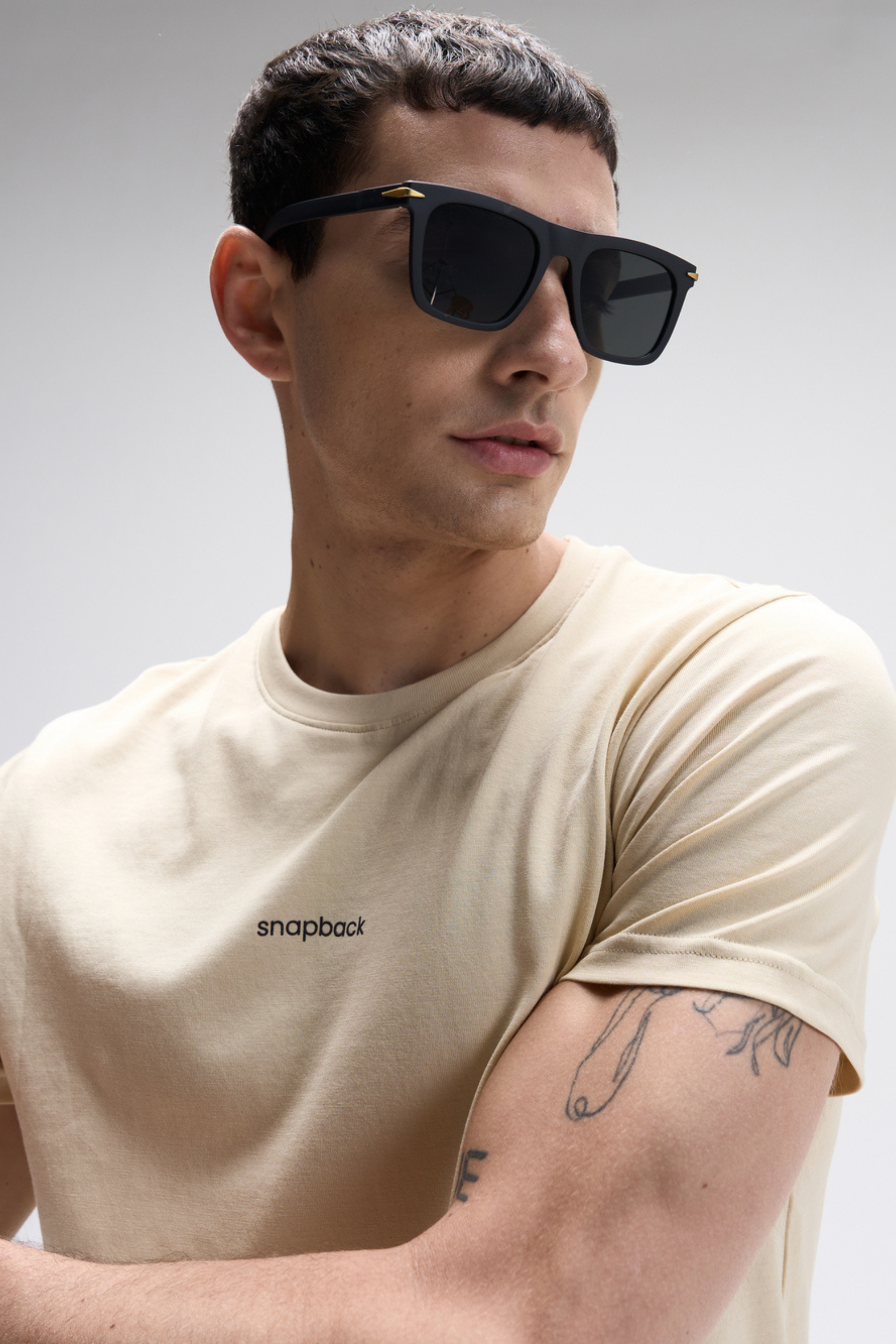 Men's SoftLuxe Crew T-shirt in summer sand color with a relaxed fit and short sleeves.